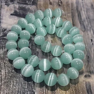 Cuentas de vidrio ojos de gato 10 mm, aguamarina, aproximadamente 40 piezas de franqueo gratuito vendedor - Imagen 1 de 3