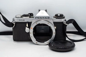 Reflex Argentique MF Asahi PENTAX ME 35mm Film SLR Camera + BOUCHON/SANGLE/PILES - Imagen 1 de 4
