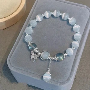 Mondstein Armband mit Glasperlen und Stern- und Schmetterlingsanhänger - Bild 1 von 5