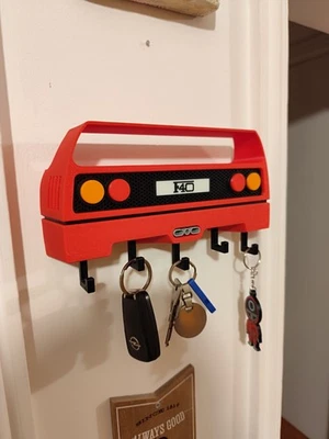 Llavero clásico exótico inspirado en el coche - organizador de montaje en pared rojo retro superdeportivo Foto 1 de 4