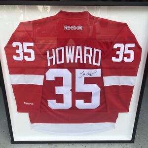 Framed autographed jimmy howard detroit redwings jersey