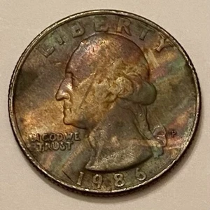 1986 P Rainbow Toned Quarter  - Picture 1 of 2