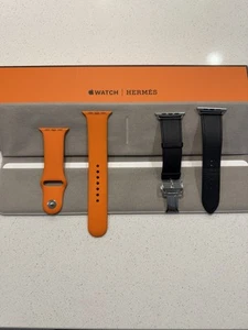 Bracelets pour Apple Watch HERMES - Bracelet sport en cuir noir et orange. - Photo 1 sur 3