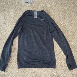Gymshark black  VITAL SEAMLESS LIGHT LONG SLEEVE TOP Sz. Large - Picture 1 of 5