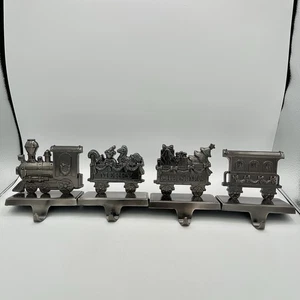 Merry Christmas Train Set Of Four Metal Stocking Hangers Toys Presents And Tree - Picture 1 of 12