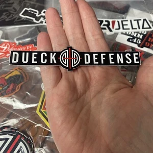 NEU 2025 SHOT SHOW Dueck Defense Tactical Aufkleber Sticker Schusswaffen Waffen Militär - Bild 1 von 1