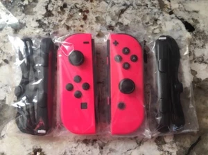 Genuine Nintendo Switch Joy-Con Splatoon 2 PINK Joycons Set Controllers Straps - Picture 1 of 1