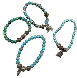 set 4 perline colore turchese bracciale charm piume marmo elasticizzato LEGGI - Foto 1 di 5