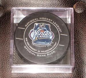 VINTAGE 2012 NHL WINTER CLASSIC FLYERS/ RANGERS OFFICIAL GAME SEALED PUCK - Picture 1 of 2