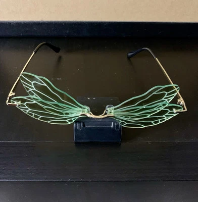 Gafas de sol Butterfly verdes/doradas para festivales de música Foto 1 de 3