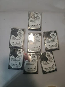 Lot of 7 Western Digital 1TB (1000GB) 2.5" Laptop  Hard Drive  WD10JUCT Untested - Picture 1 of 6