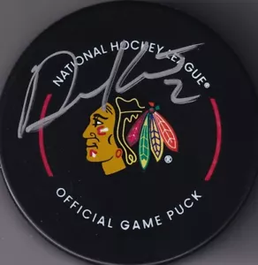 BECKETT DUNCAN KEITH SIGNED CHICAGO BLACKHAWKS REAL GAME MODEL PUCK 1W456928 - Picture 1 of 2