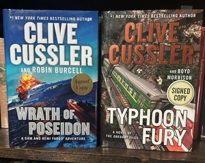 Lot Of 2 by Clive Cussler  "Wrath of Poseidon" and "Typhoon Fury" both signed - Imagen 1 de 3
