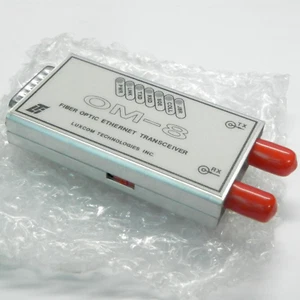 NEW LUXCOM OM-8 FOIRL AUI FIBER MEDIA CONVERTER AUI TO 10 BASE FL PORT NIB/NOS - Picture 1 of 3