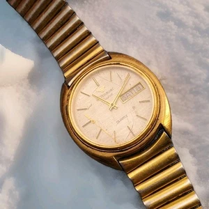 Vintage WITTNAUER Geneve QUARTZ SWISS GOLD TONE MEN'S WATCH FOR PARTS  - Picture 1 of 10