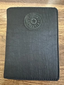 Cartera con soporte para pasaporte de nailon negra Kipling 4 ranuras para tarjetas de crédito 4 bolsillos antideslizantes - Imagen 1 de 3