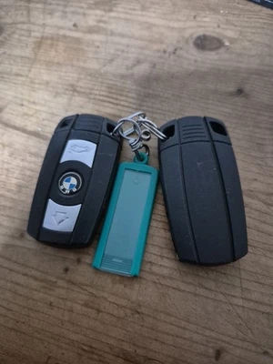 CHIAVE ORIGINALE TELECOMANDO COVER  GUSCIO BMW MODELLO 3 TASTI CORNICE ARGENTO - Immagine 1 di 2