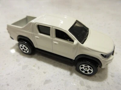 Toyota Hilux 2020 Matchbox 2018 camioneta pickup de juguete diecast blanca Foto 1 de 4