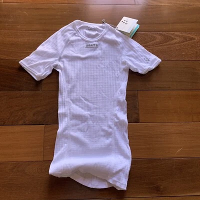 Camiseta deportiva Craft Zero blanca y platino para correr mediana para mujer Foto 1 de 4