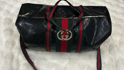 Bolso de Mano Gucci GG Boston Correa para el Hombro Lona Cuero Marrón, Lona Negra Dorada Foto 1 de 4