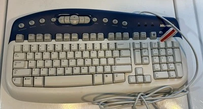 Microsoft Natural Multimedia Keyboard Ergonomic Comfort 1.0A  Model RT9470 Wired - Image 1 of 4
