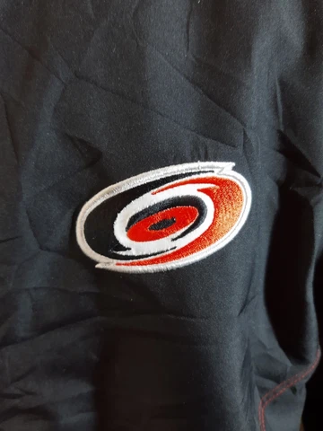 CAROLINA HURRICANES CENTER ICE REEBOK NHL QUILT LINED JACKET Cover
