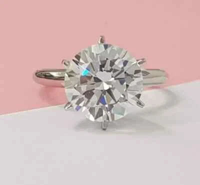 Anillo solitario de diamantes blancos de corte redondo de 10,30 quilates certificado enchapado en oro blanco de 14 quilates Foto 1 de 4