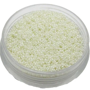 Microperline in vetro avorio 50 grammi microsfere senza foro 0,6-0,8 mm + scatola portaoggetti - Foto 1 di 4