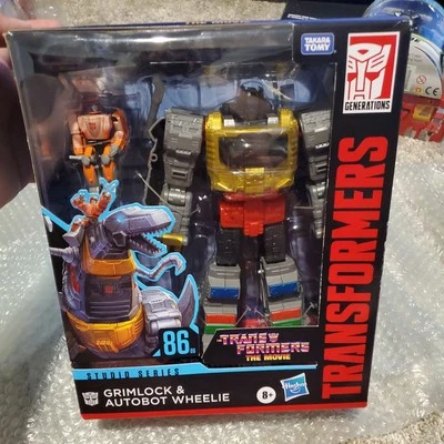 Hasbro Transformers 86-06 Grimlock and Autobot Wheelie - Image 1 of 4