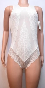 Body a rete in pizzo elasticizzato Flora by Flora Nikrooz (T80486) colore avorio, taglia M - Foto 1 di 12