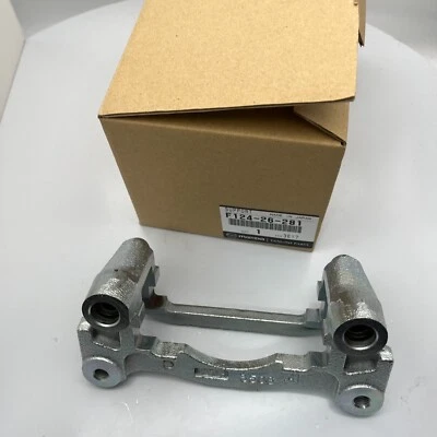 Soporte de montaje genuino MAZDA RX-7 FD3S F124-26-281 soporte de acero para 17 pulgadas Foto 1 de 4