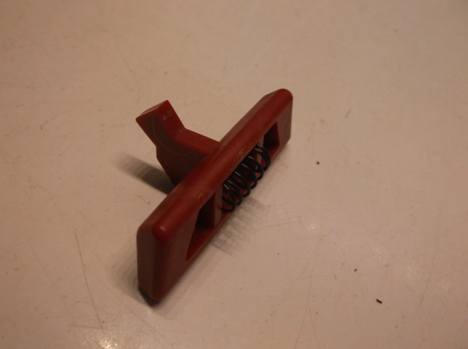 90572573C Switch Lock & 90548007 Spring Off A Craftsman 900.98020 Line Trimmer - Image 1 of 1