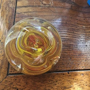 Artistic Glass Paperweight with Swirling Yellow Design - Picture 1 of 3