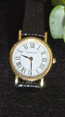 Reloj de cuarzo vintage Tiffany & Co. 23 mm | Caja de oro amarillo sólido de 14 k | Blanco Foto 1 de 4
