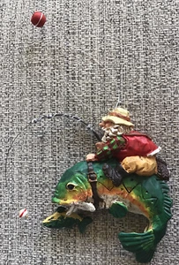 Santa Fisherman, Riding Fish Christmas Ornament New - Picture 1 of 3