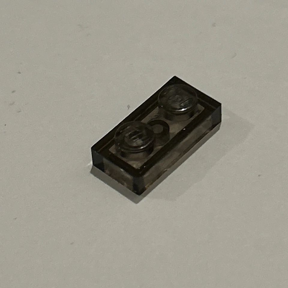 1x LEGO® 6514006 - 3023 - Platte 1 x 2 Transparent Schwarz - Bild 1 von 1