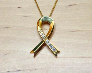 BEACH FASHION GOLD TONE RHODIUM AWARENESS RIBBON WHITE CZ'S PENDANT NECKLACE - Picture 1 of 6