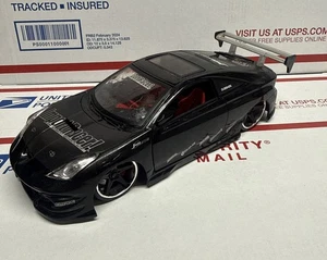 Jada Toys Import Racer Toyota Celica BLACK 1:24 Scale Diecast - Picture 1 of 16