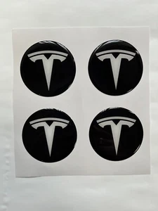 4x Tesla Aufkleber für Radnabenkappen Selbstklebende Embleme für Felgen - Bild 1 von 6