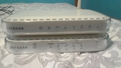 Módem por cable NETGEAR CMD31T + Router inalámbrico WiFi WGR614v10 (4 puertos 10/100 54G) Foto 1 de 4