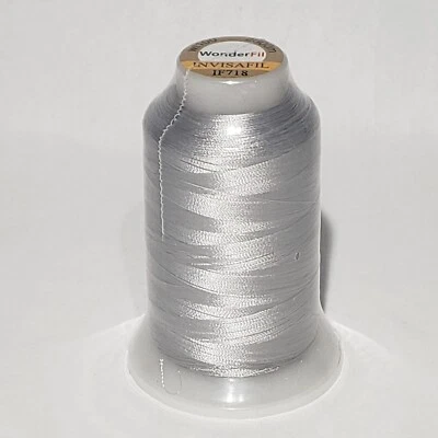 InvisaFil 100wt cottonized poly Thread solid colors 2734 yd spool WonderFil - Image 1 of 4