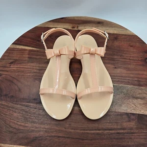 Stuart Weitzman Mellie Sandals Women's 6 Tan Nude Jelly T-Strap Bow Ankle Strap - Picture 1 of 12