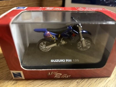New Ray Suzuki RM 125 Motocross Mini Dirt Motocyle blue, 1/32 Die Cast NIB - Image 1 of 3