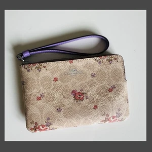 Coach Eckreißverschluss Handgelenktasche aus charakteristischem Canvas mit Blumenmuster - NEU - Bild 1 von 4