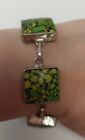 silver tone bracelet With Green Colored Stones 8 Inches In Length