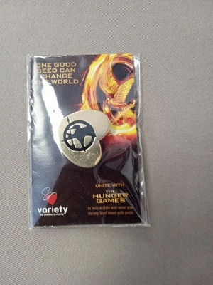 Hunger Games Pin, Variety The Children’s Charity, In Original Packaging￼ New - Image 1 of 2