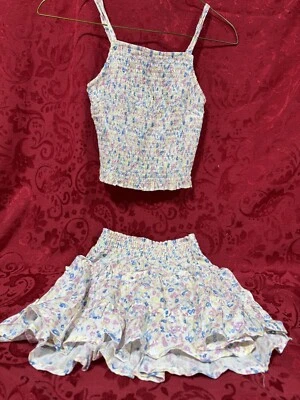 Saia marfim vintage Havana feminina média. &Top babados infantis com estampa floral rosa/azul - Imagem 1 de 4