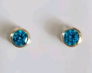 Blue Topaz Lab-Created Round Cut Bezel Stud Earrings 14kt Solid Yellow Gold - Picture 1 of 23