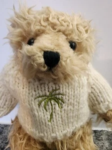 Oso de peluche con suéter GAINEY SUITES HOTEL 10" - Imagen 1 de 3