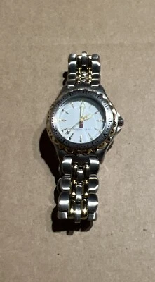 Reloj Fossil para mujer PR5009 - Logo Norweigan Cruise Lines - Tonos plateados y dorados Foto 1 de 4